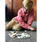 Boy plays with Alphabet Pebbles