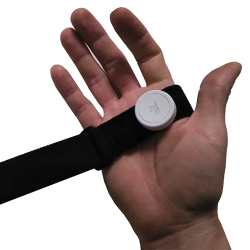 Bluetooth Tiny Switch wireless assistive switch positioned on palm