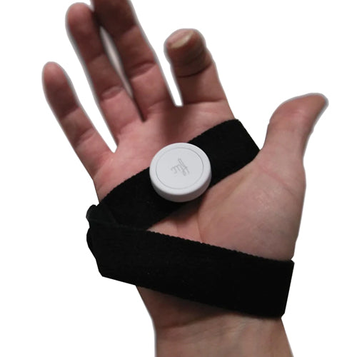 Bluetooth Tiny Switch mounted on Vel-Strap around hand