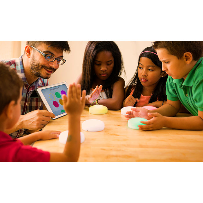 Students using Cosmo Dots with the Cosmo Learning System during a group activity